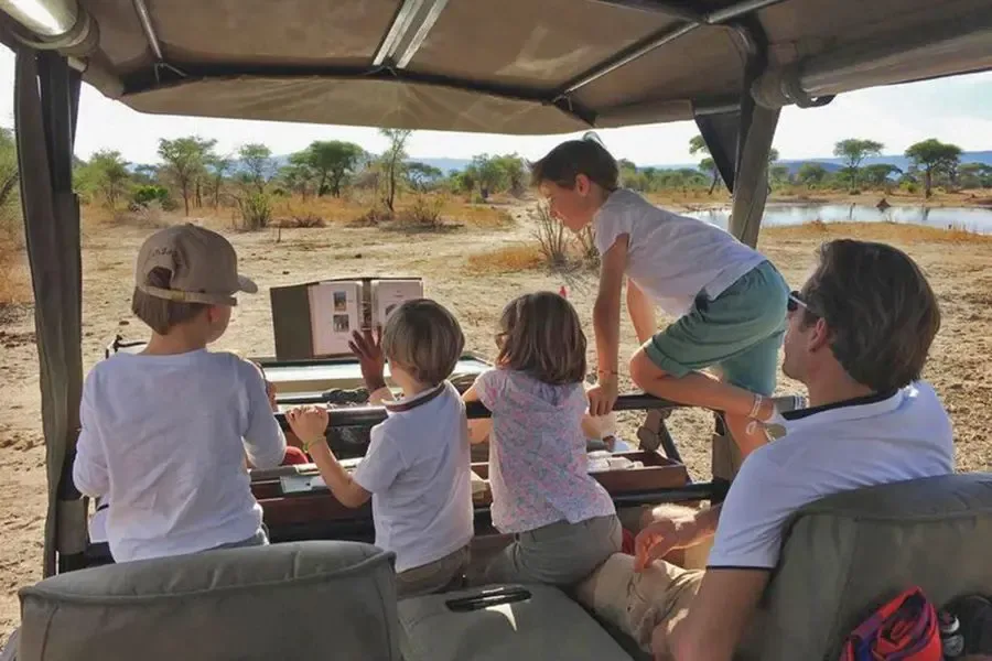 Family enjoying luxury Serengeti safari and Zanzibar beach