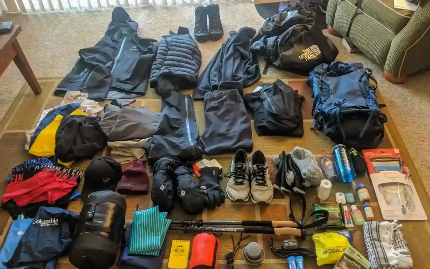 Climbers with essential gear on Mount Kilimanjaro, showcasing preparation for diverse climates