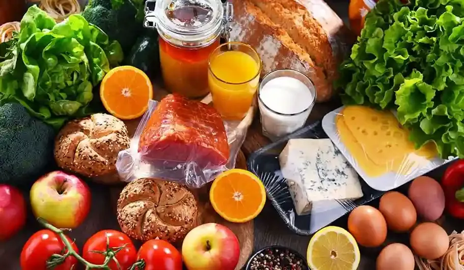 Trekker eating energy-boosting meal on Mount Kilimanjaro