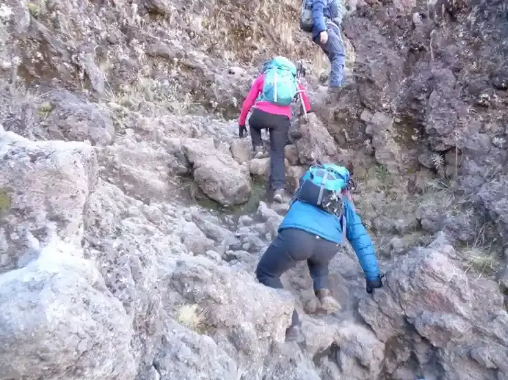 Trekker navigating a challenging route on Mount Kilimanjaro