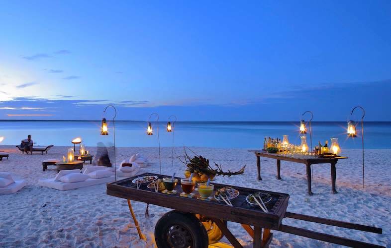 Romantic Zanzibar beachfront villa with turquoise waters, perfect for couples and honeymoons